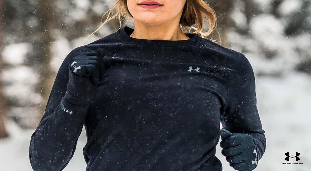 a girl running in cold weather layers