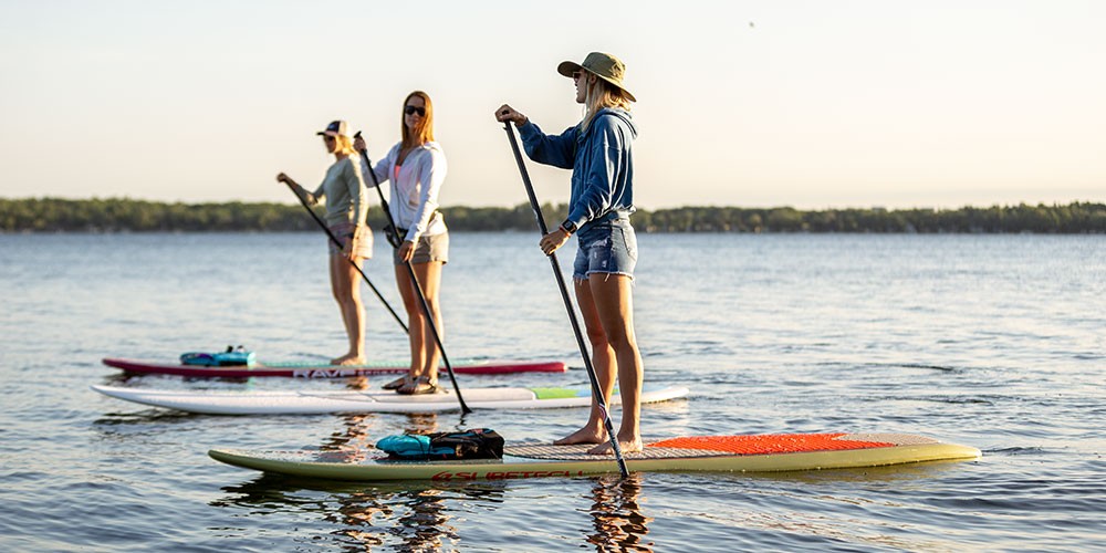 https://scheels.scene7.com/is/image/Scheels/1000px_header_RC_shops-paddleboard?wid=1000