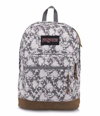 white jansport backpack with leather bottom