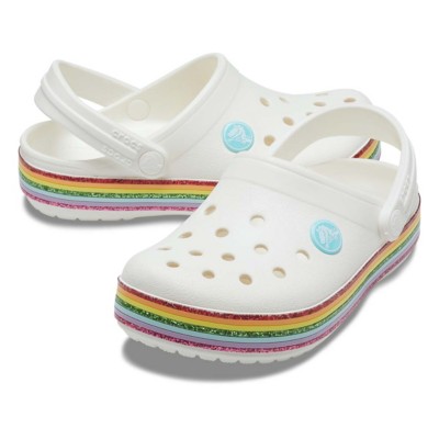 white crocs with rainbow writing