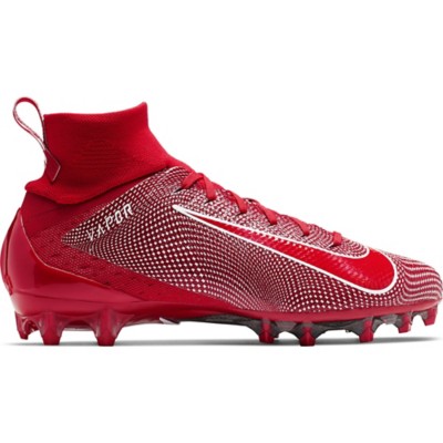 white football cleats with gold bottom