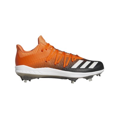 orange and white baseball cleats