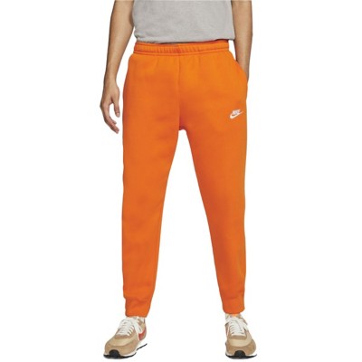 orange nike jogging pants