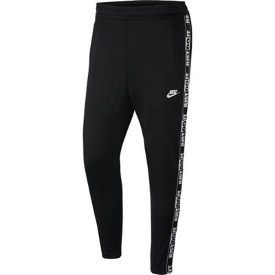 nike sportswear taped pants