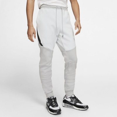 white and grey nike tech fleece