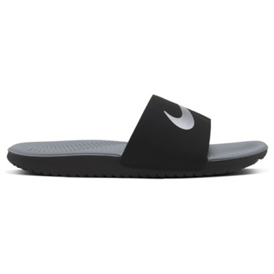 grey and black nike slides