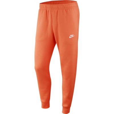 red and white nike joggers