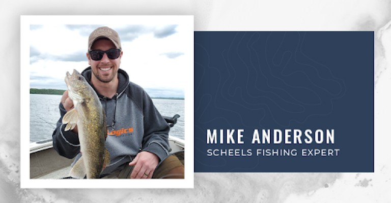 mike anderson scheels fishing expert holding a fish