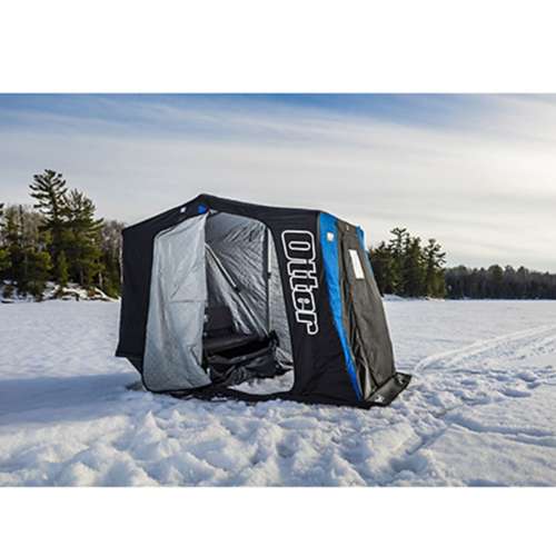 A Winter Yellow Fishing Tent Stands Next To An Ice Pack On Snow