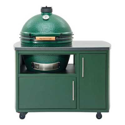 large green egg sitting in a custom cooking island