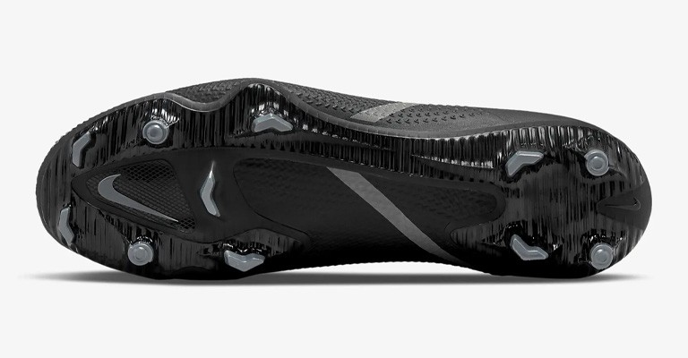 the outsole of a frim ground soccer cleat