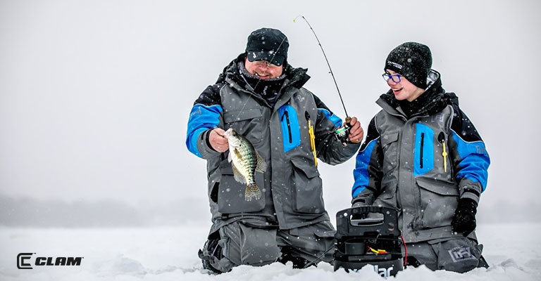 A dad and son out ice fishing