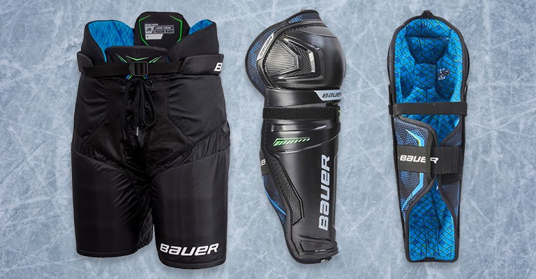a pair of hockey pants and shin pads for hockey