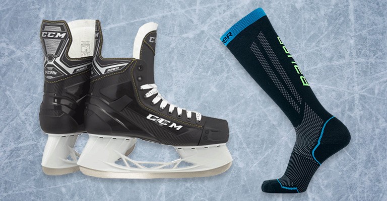 a pair of hockey skates and socks