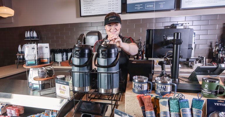 barista making coffee at Ginna