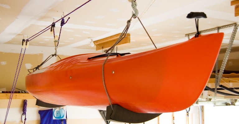 kayak on a suspension rack