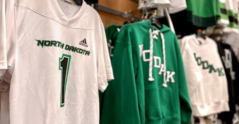 UND hockey fan gear hanging on display