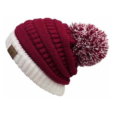 red and white pom pom hat