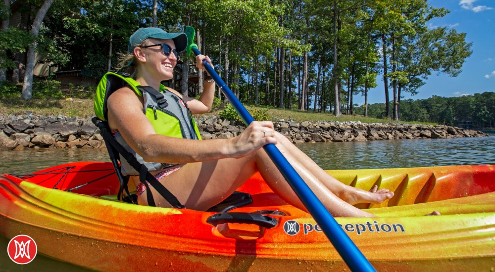 woman in a perception kayak