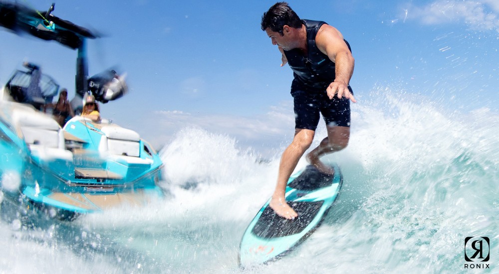 guy wakesurfing on Ronix board