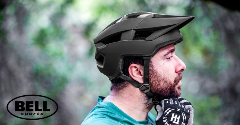 A man wearing a bike helmet