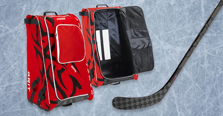 a hockey stick and hockey equipment bag