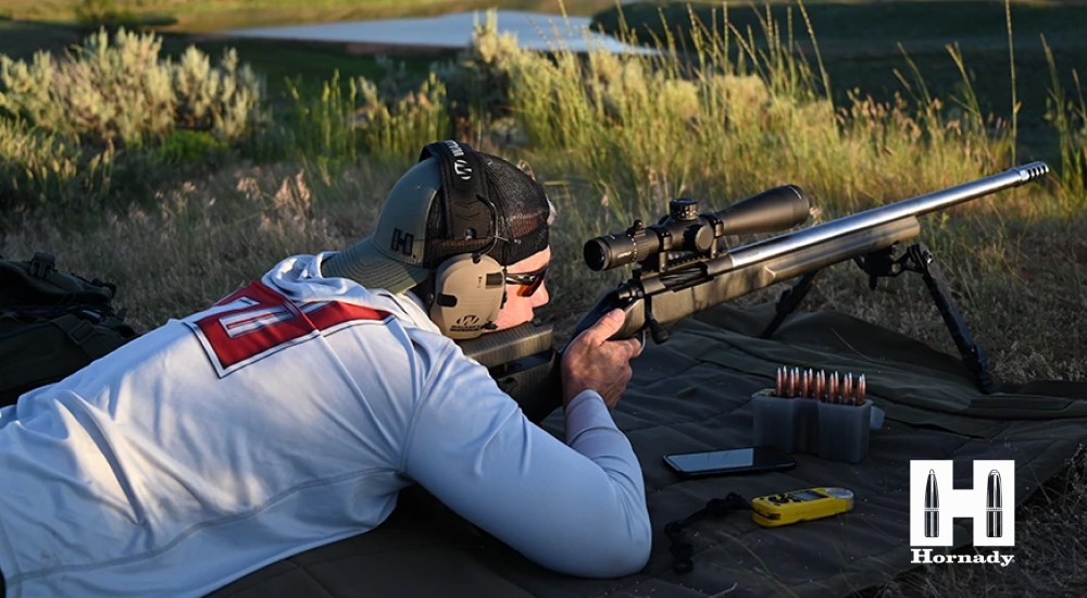 a man using hornady superformance rounds at the range