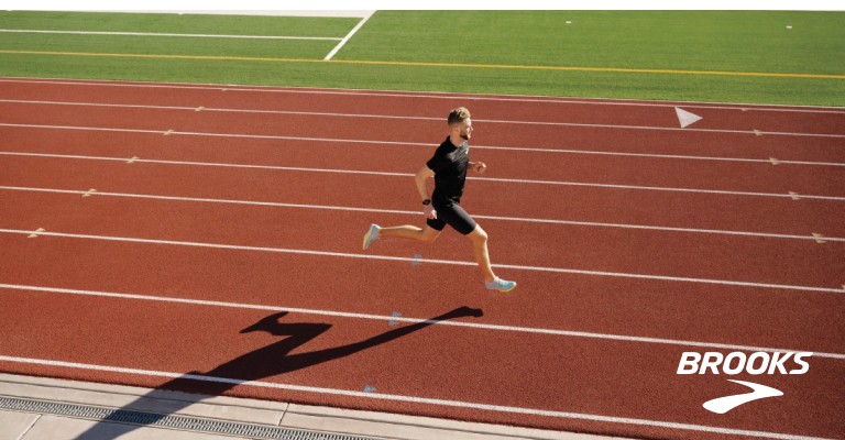 Runner running on a track