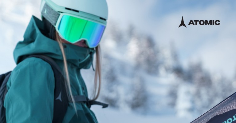 Woman wearing a ski helmet and goggles