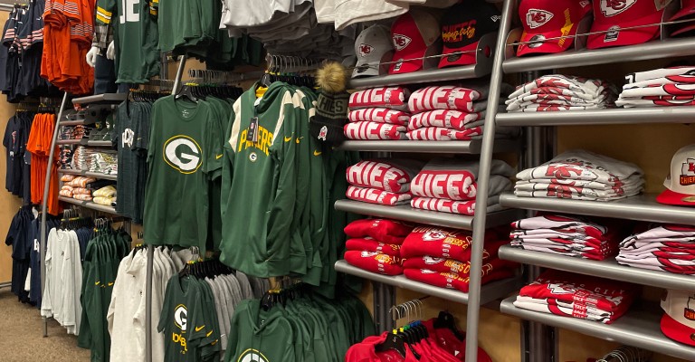 a variety of nfl clothing from different teams 