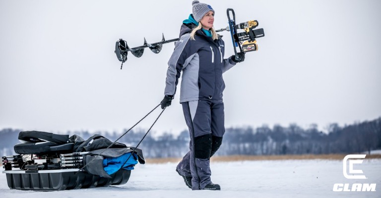 a woman holding a cordless drill ice auger