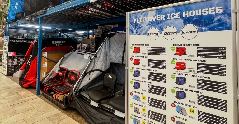 a few ice fishing shelters on display at st cloud scheels fishing shop