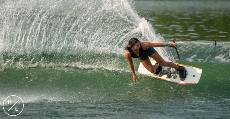 woman wakeboarding on a hyperlite board