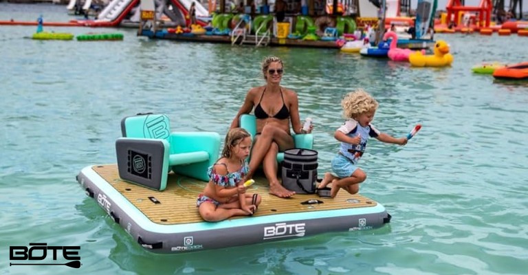 family in the ocean on bote inflatable water island