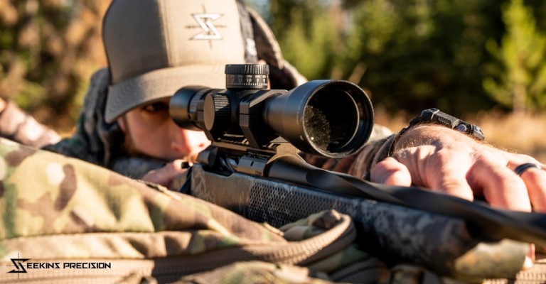 hunter using riflescope