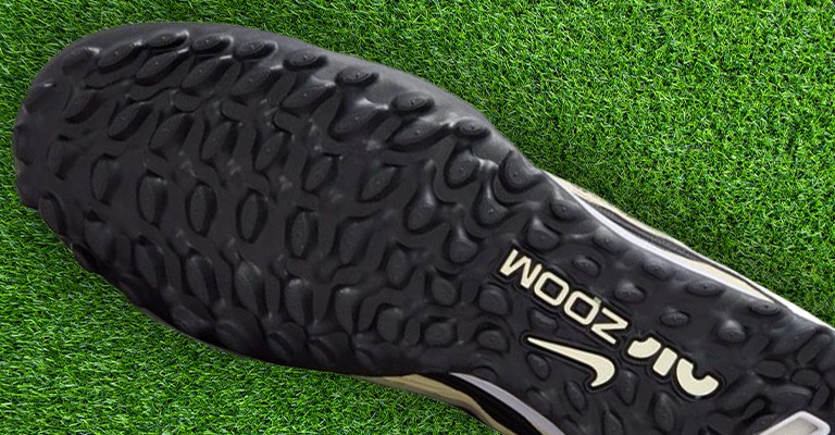 a turf soccer shoe outsole