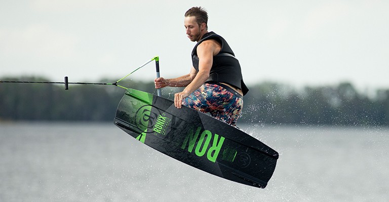 guy wakeboarding at the lake