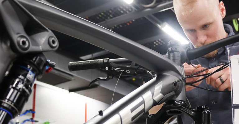 an associate working on a bike