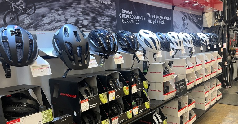 a variety of bike helmets at a scheels