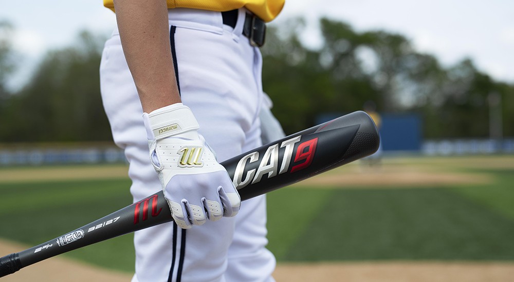 Baseball player about to use his new bat