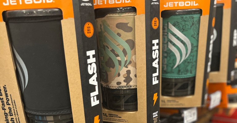 a variety of jetboil cookware at a scheels store