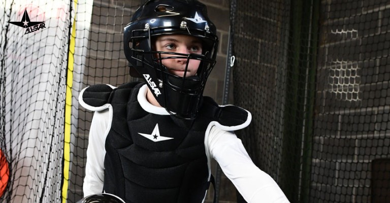 a kid wearing a chest protector