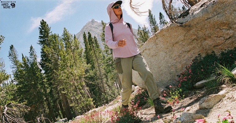 a woman out hiking wearing upf clothing