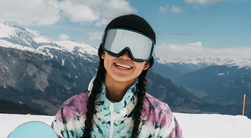 Snowboarder wearing snow goggles