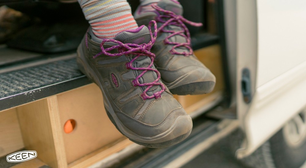 a person wearing hiking platform shoes