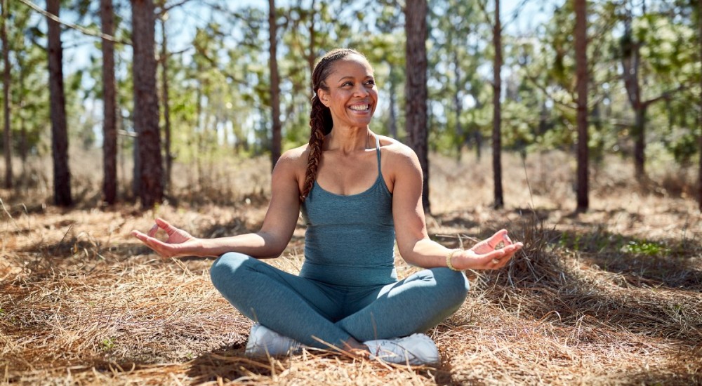 A woman wearing yoga clothing