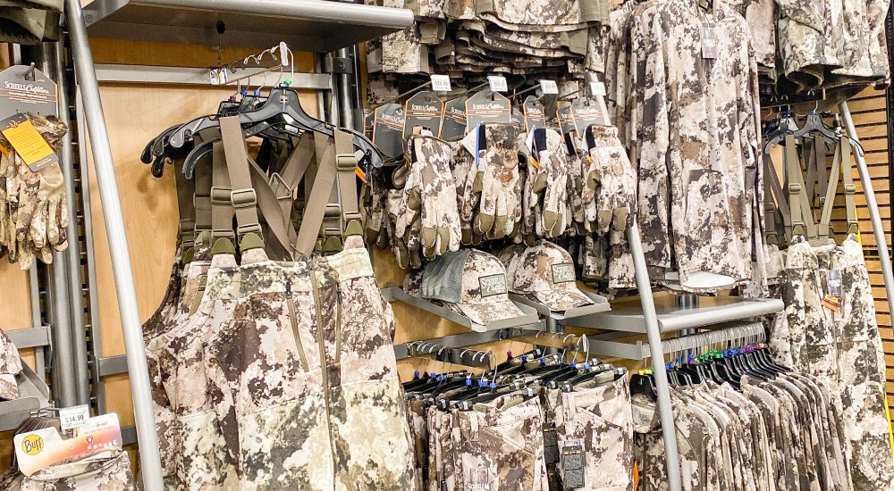 hunting clothing hanging in iowa city scheels hunting shop