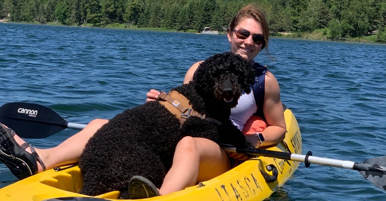 Jayden out kayaking with her dog