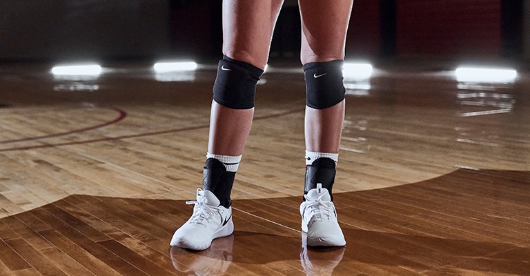 a volleyball player wearing volleyball knee pads