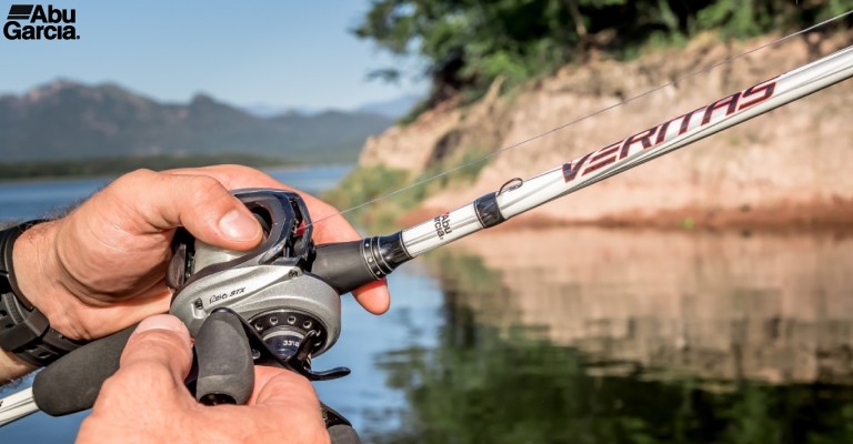 a fisherman using a low profile baitcast reel